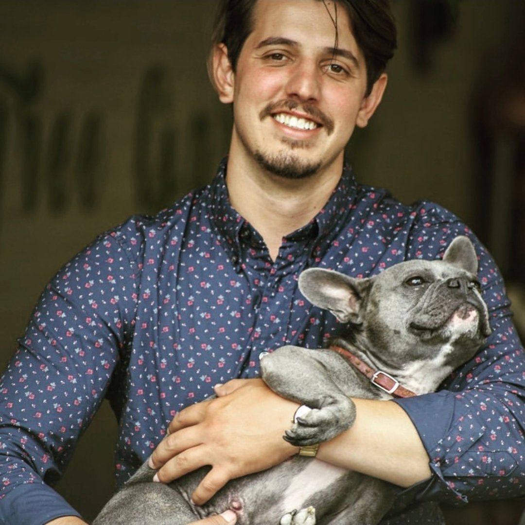 V.Z. holding Blue, a grey French Bulldog who was the reason this site exists